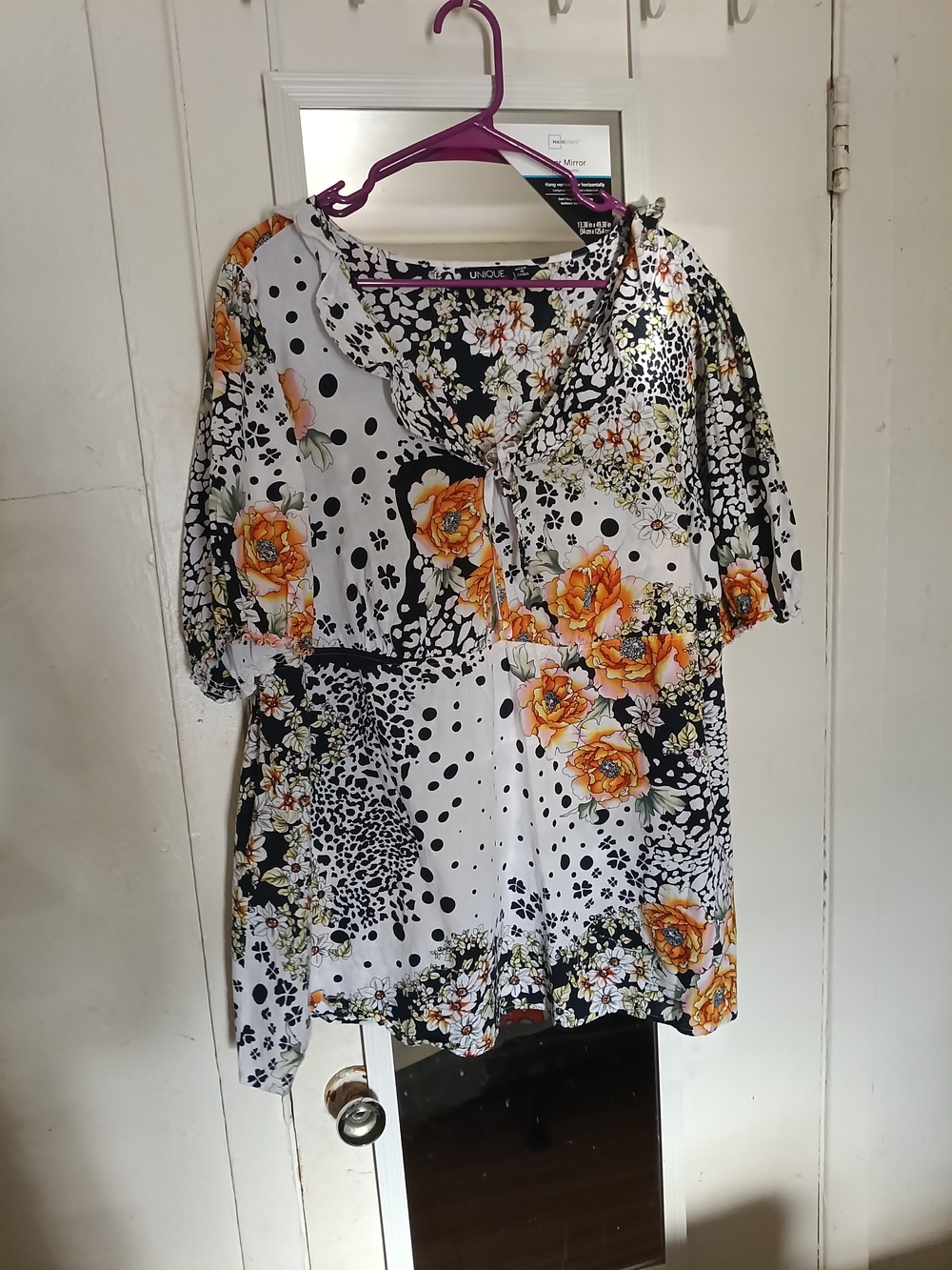 Unique Spectrum Orange Floral & Black Polka Dot Tie-Neck Blouse